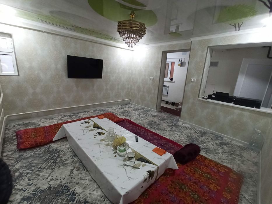 Дукан имараты жасаў уйи менен бирге сатылады