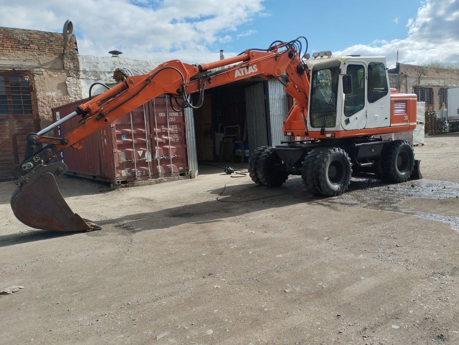 Колёсный экскаватор