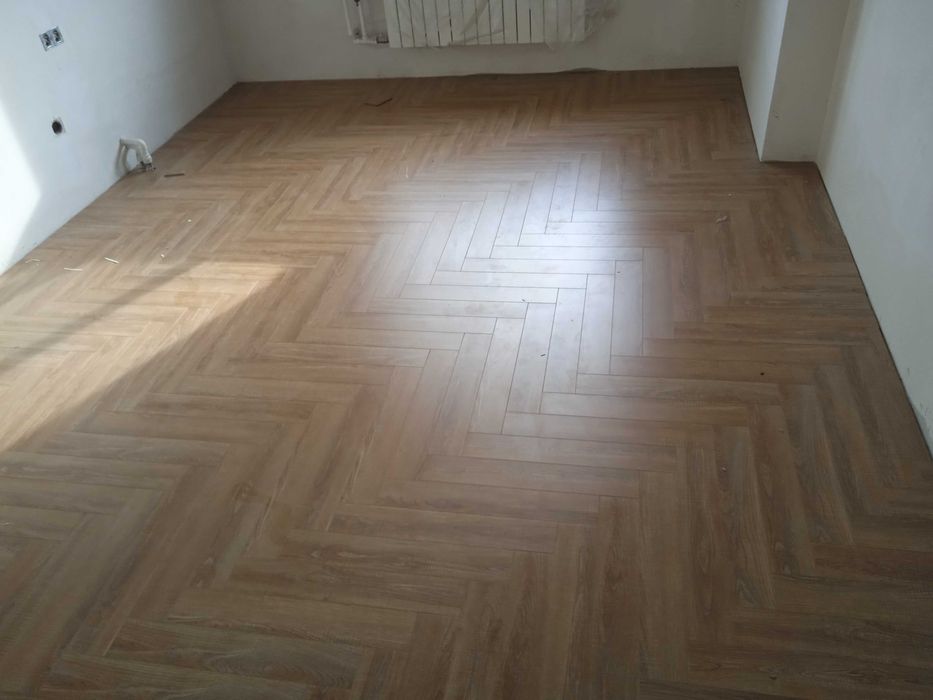 Укладка ламината.Монтаж ламината