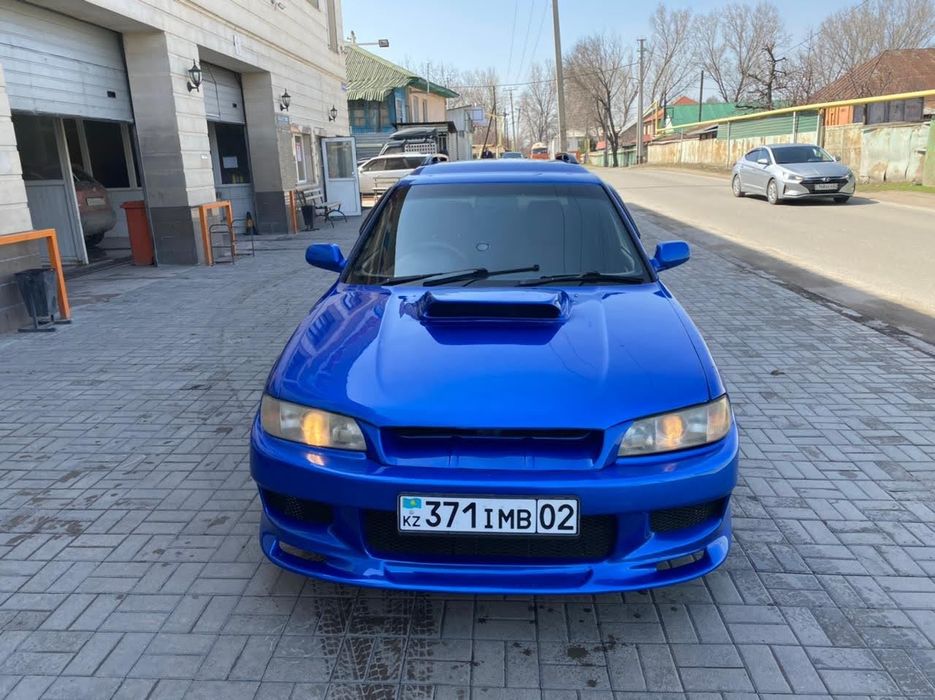 Передний бампер Субару Легаси б3