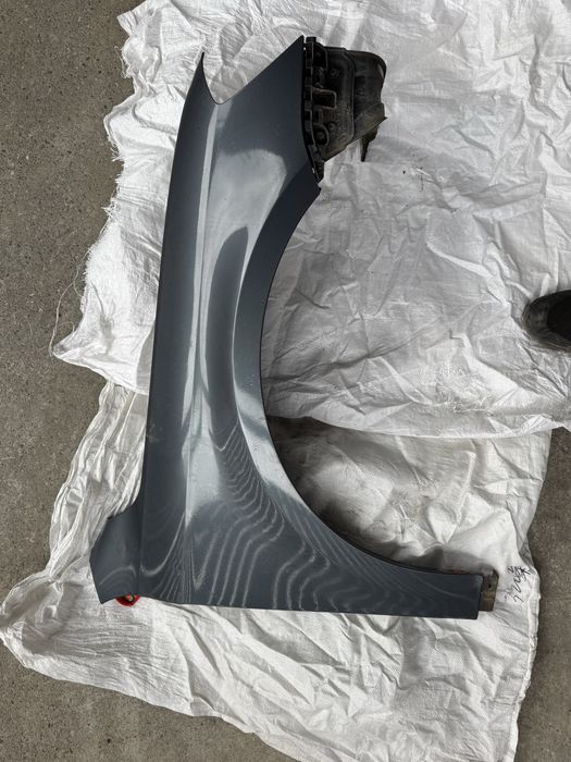 Aripa dreapta fata pt vw passat b7 pe verde