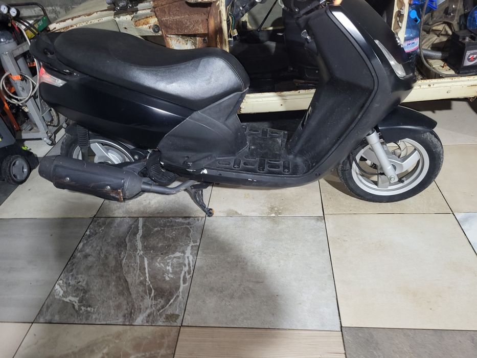 Скутер пежо вивасити