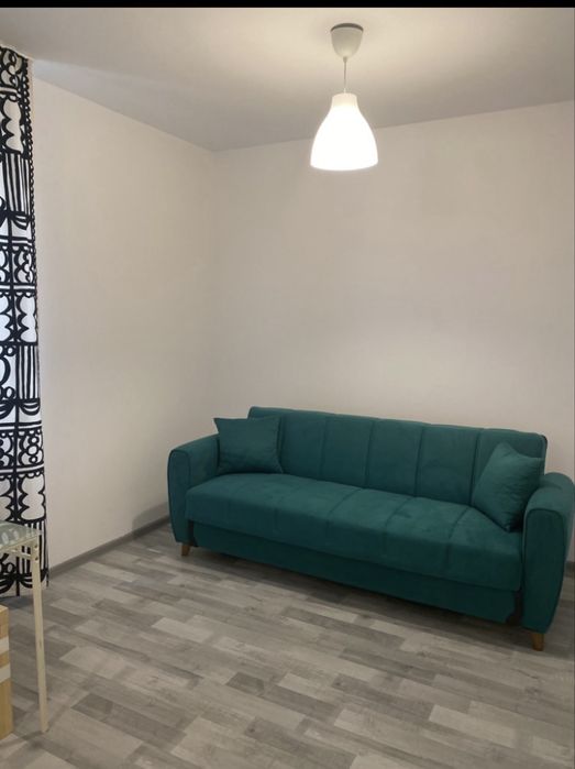 Inchiriez garsoniera 70 mp,,cu curte
