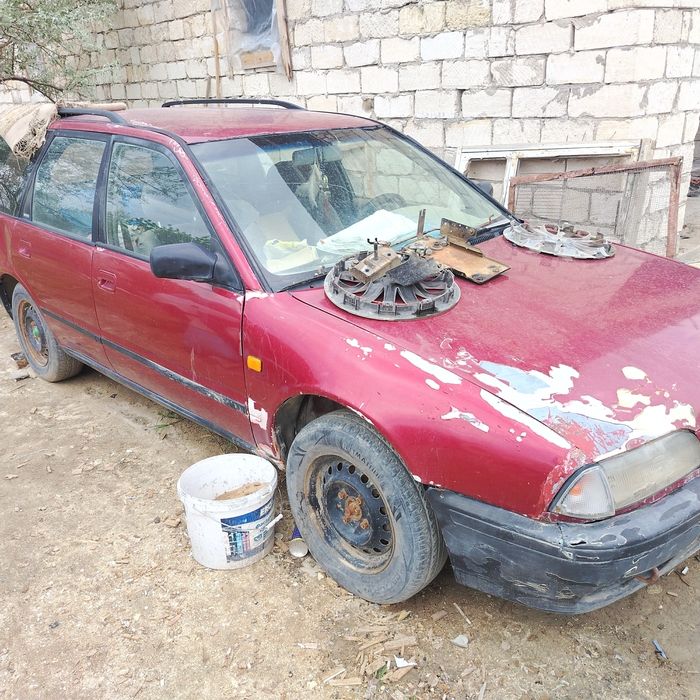 Ниссан.    Примера.