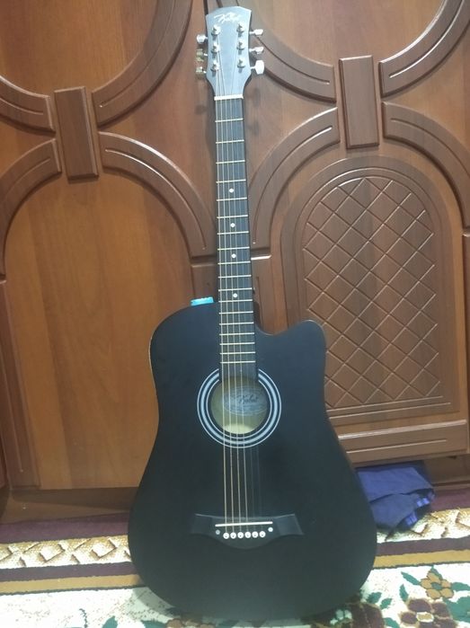 Akustik gitara boshlovchilar uchun