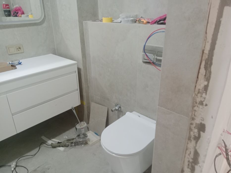 Кафельщик качество гарантия плюс сантехник в общем ванна и туалет под