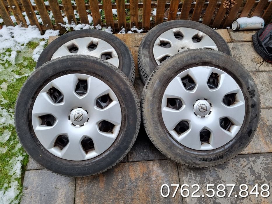 Roti iarna Opel Astra J 205 60 16 cu capace originale