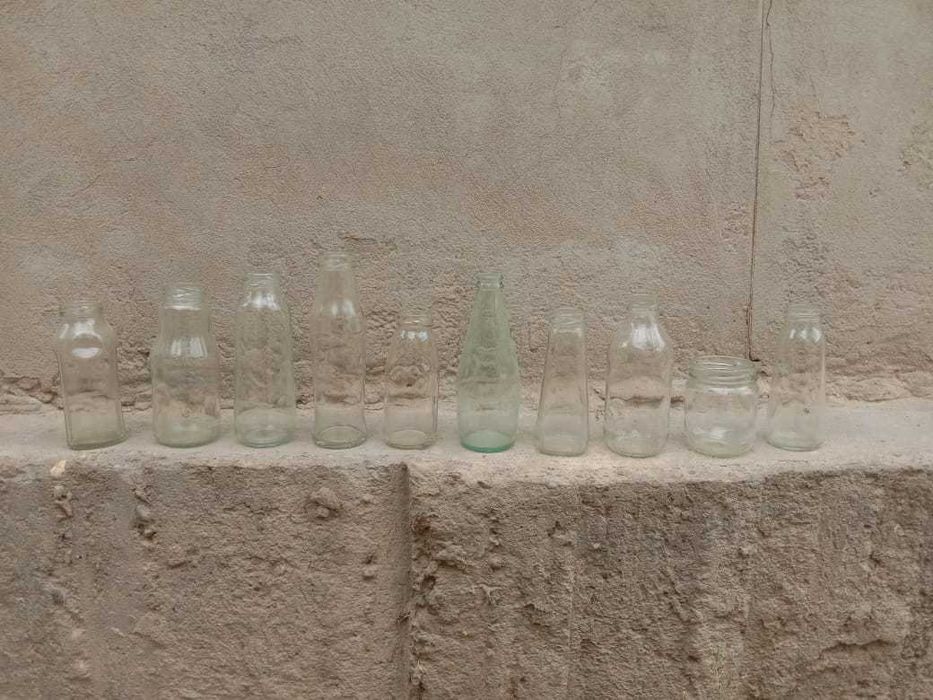 Бутылки из прозрачного стекла