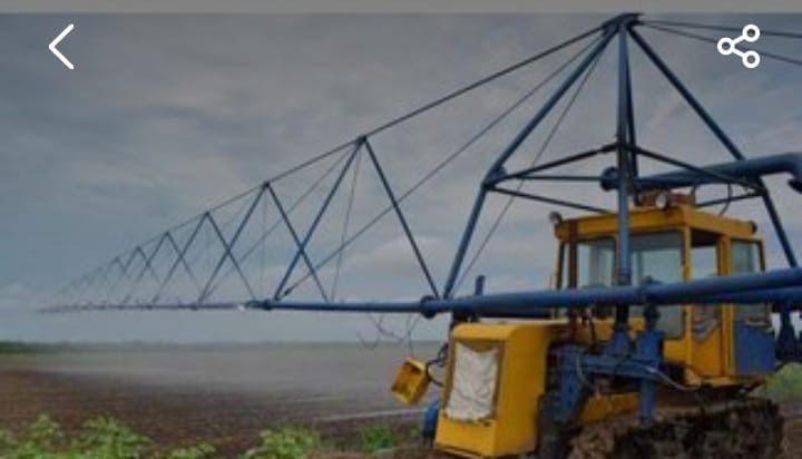 Трактор ДТ-75 с дождевальной установкой