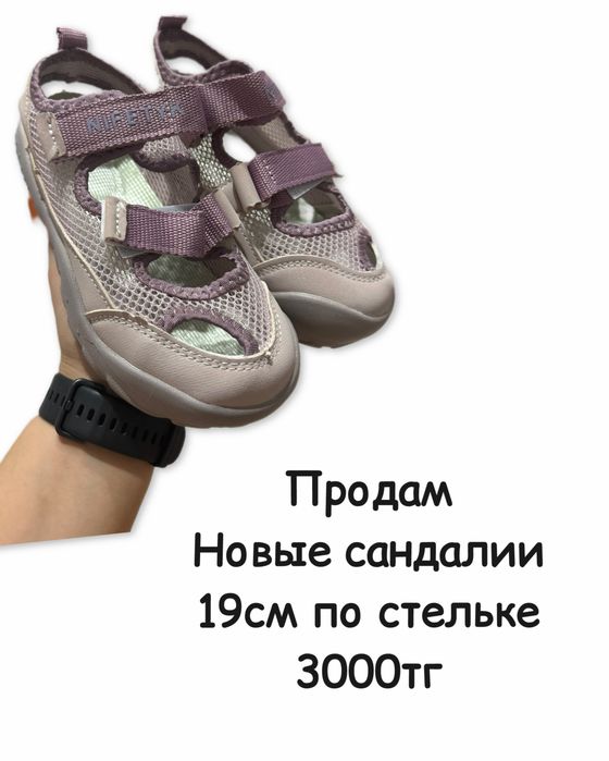 Продам новые сандалии