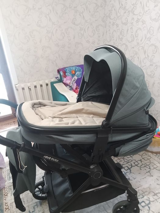 Продам универсальную коляску 2 в 1  ining baby