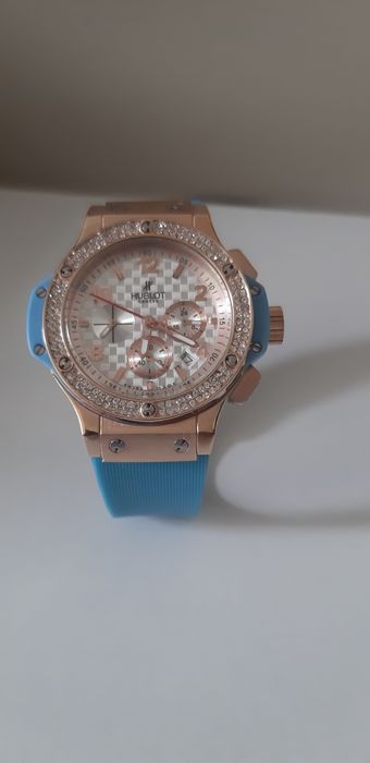 Ceas unisex ,nou din titan ,cristale swarovski si curea din silicon