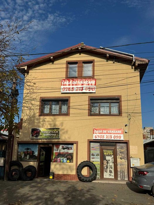Casă de vânzare + 2 spații comerciale funcționale + foișor inchis