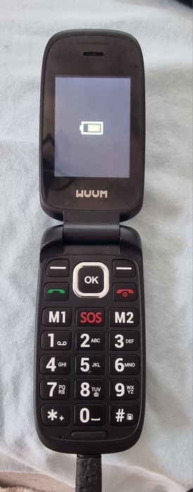Телефон с копчета  Wuun