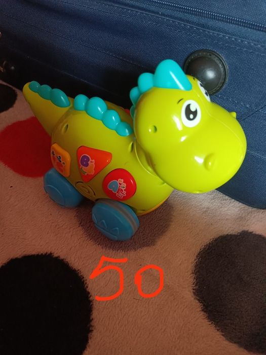 Dinozaur verde interactiv