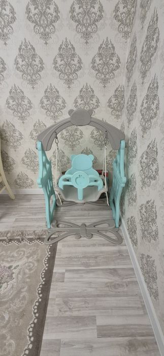 Детская горка-качеля