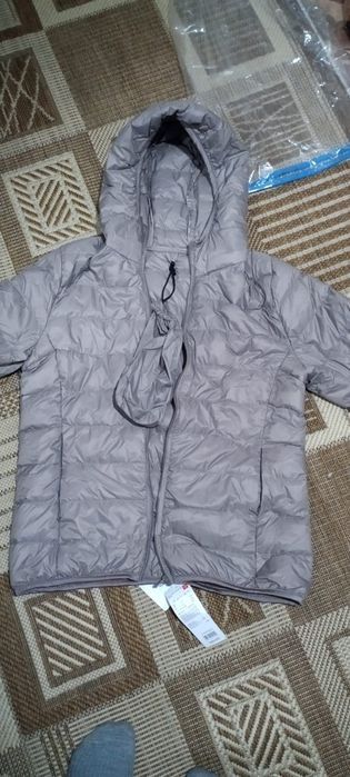 Продам пуховик новый