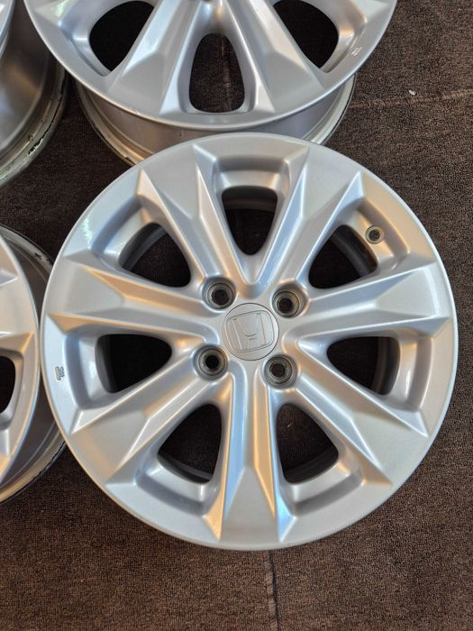 4 Jante Aliaj 4x100 15'' 5.5J ET 45 - OEM Honda JAZZ - Enkei Japonia - JANTE CA NOI !