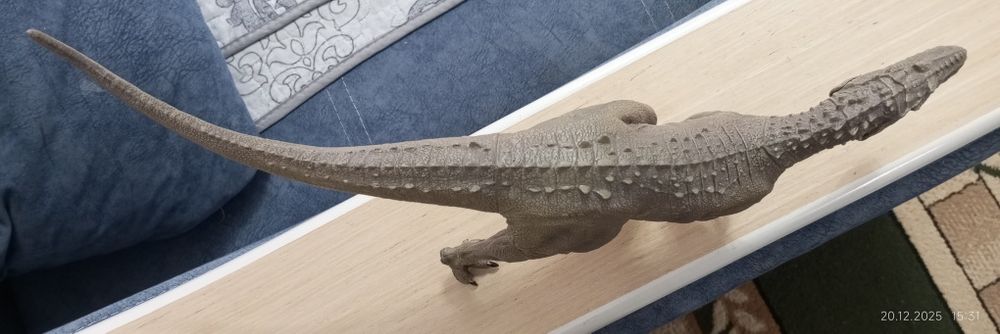 Игрушка динозавр