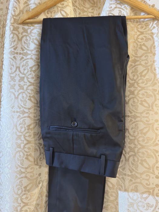 Costum efectiv ca nou