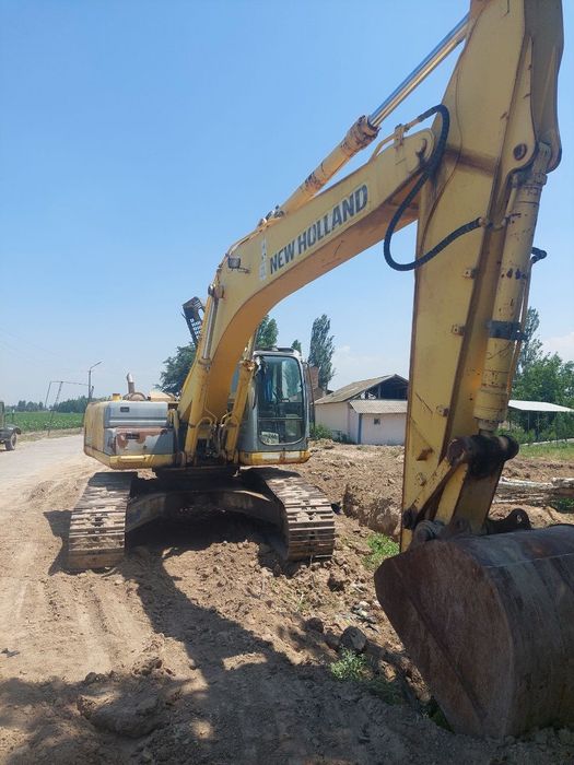New Holland экскаватор