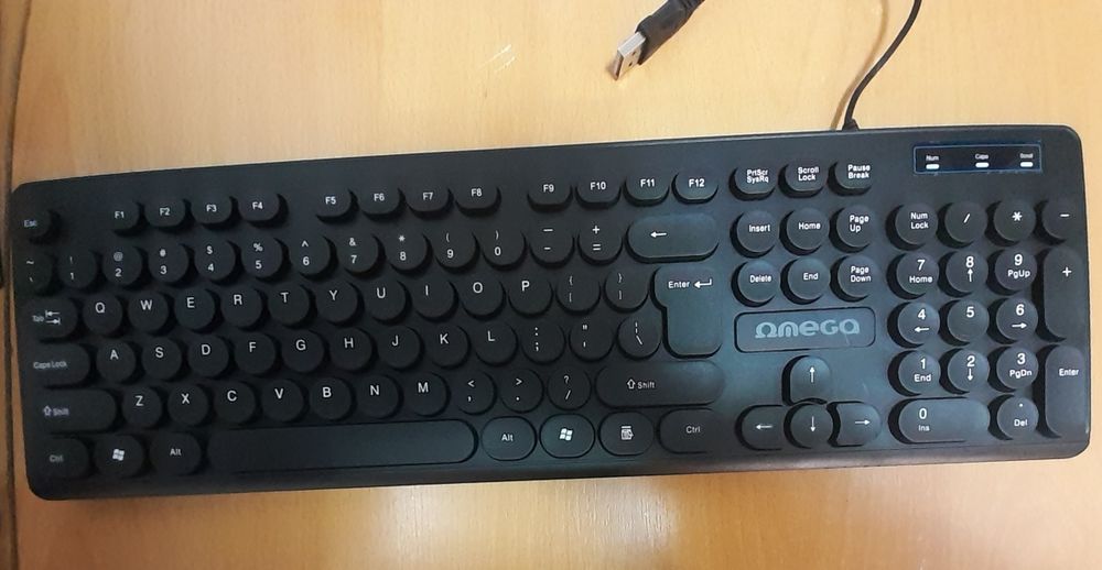 Vând Tastatura Omega cu fir,taste în relief și mufă USB