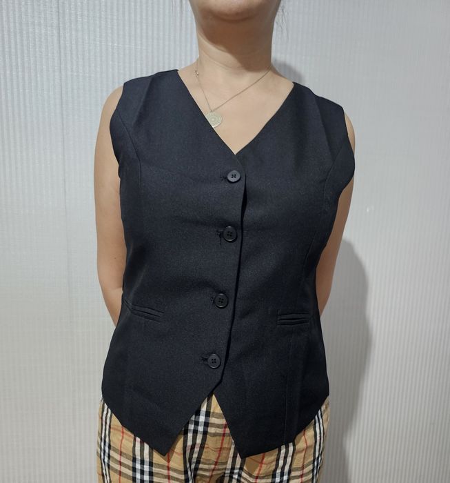 Продам женский жилет