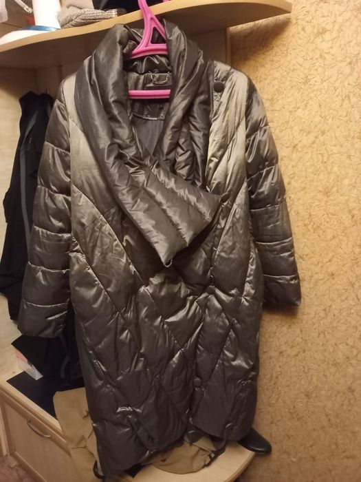 Продам Пуховик .