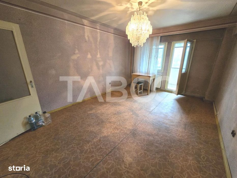 Apartament decomandat 4 camere 4 balcoane 2 bai etaj 1 Central Sibiu