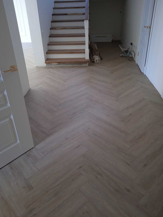 Укладка ламината.Монтаж ламината