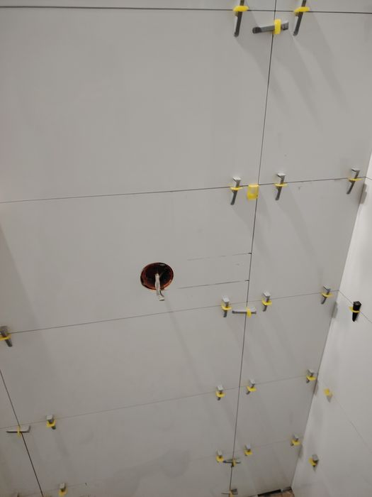 Плиточник, кафельшик.