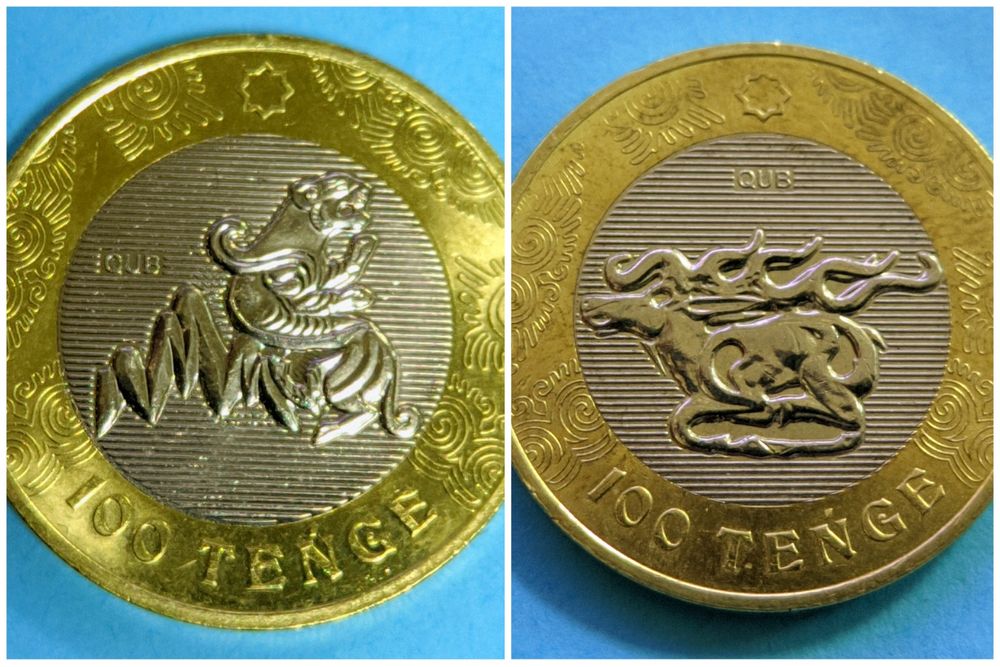 Монеты 100 тенге. Юбилейные монеты. Брак