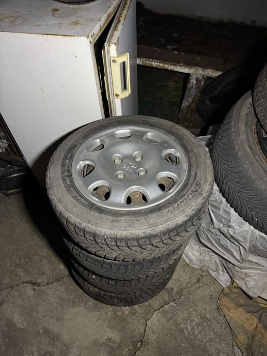 Джанти от пежо 185/65/14 със зимни гуми