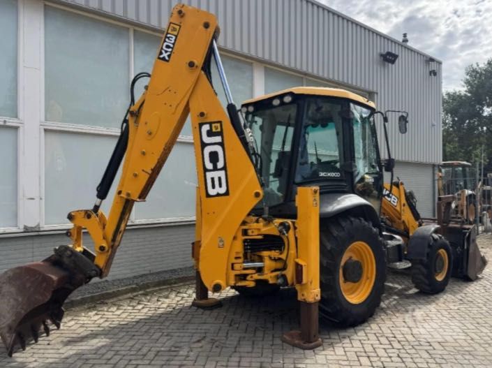 Комбиниран багер JCB 3CX | 2011 г. | 4x4 | 4 720 моточаса | 4-в-1
