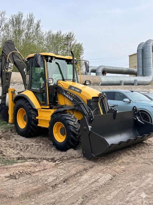 Эксковатор погрузчик 3в1