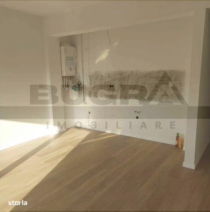 Apartament finisat cu 3 camere, 75 mp,  parare, zona Baciu Regal