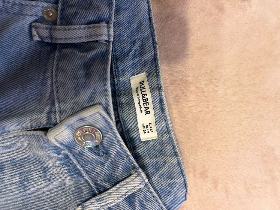 Blugi blu cu talie înaltă