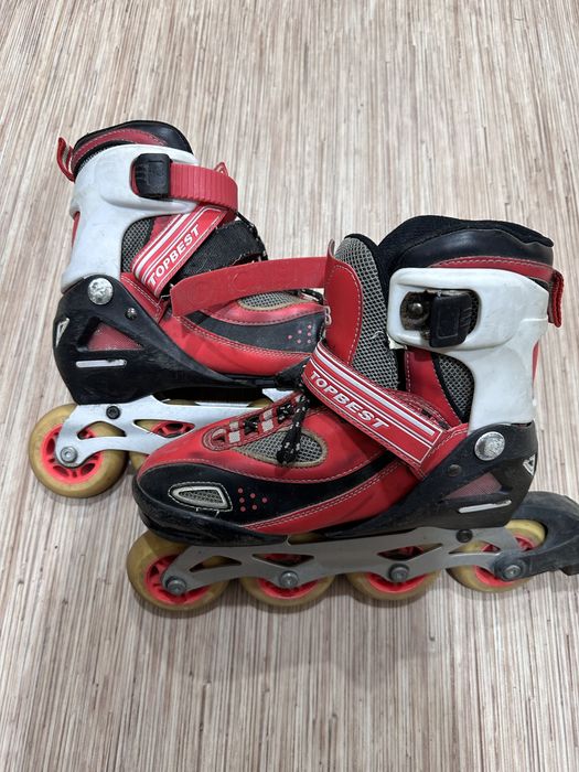 Роликовые коньки