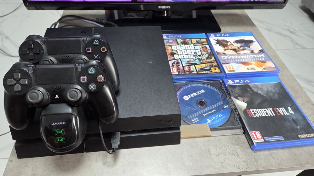PS4 1TB + PACHET GAMING  CU TV +2 manete + statie incarcare + 4 jocuri pe cd + multe jocuri digitale descarcate!