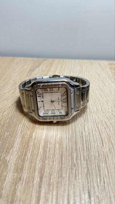 часы Cartier купил месяц назад