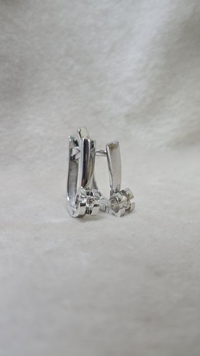 Серьги из белого золото