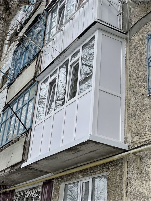 Пластиковые окна,двери и балконы