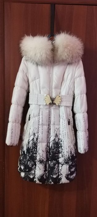 Продам зимний пуховик Б/У