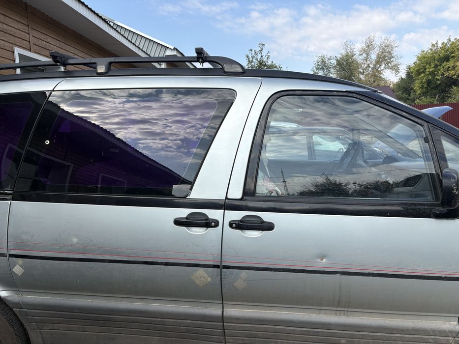 Toyota Previa-семейный минивэн
