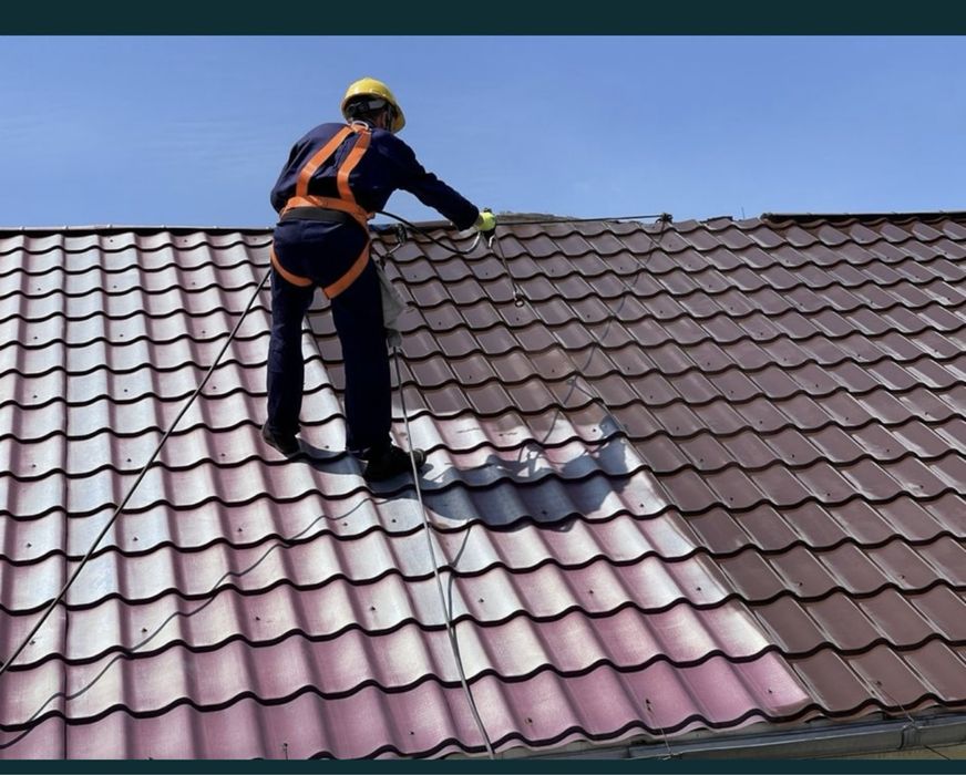 Покраска крыш ворот забора