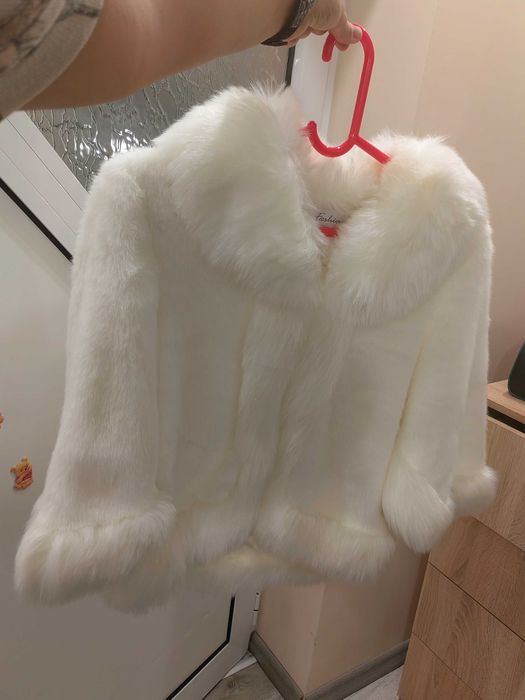 Пухено палто за зимните месеци.