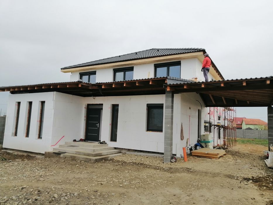 Executăm case in rosu si finisaje