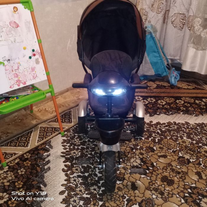 Детский велосипед с управлением