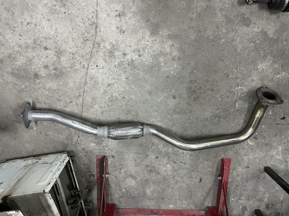 Продам приемную трубу(штаны) некия 1.5 donc оригинал в новом состоянии