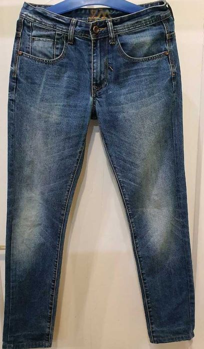 Джинсы на мальчика 14-15 лет.